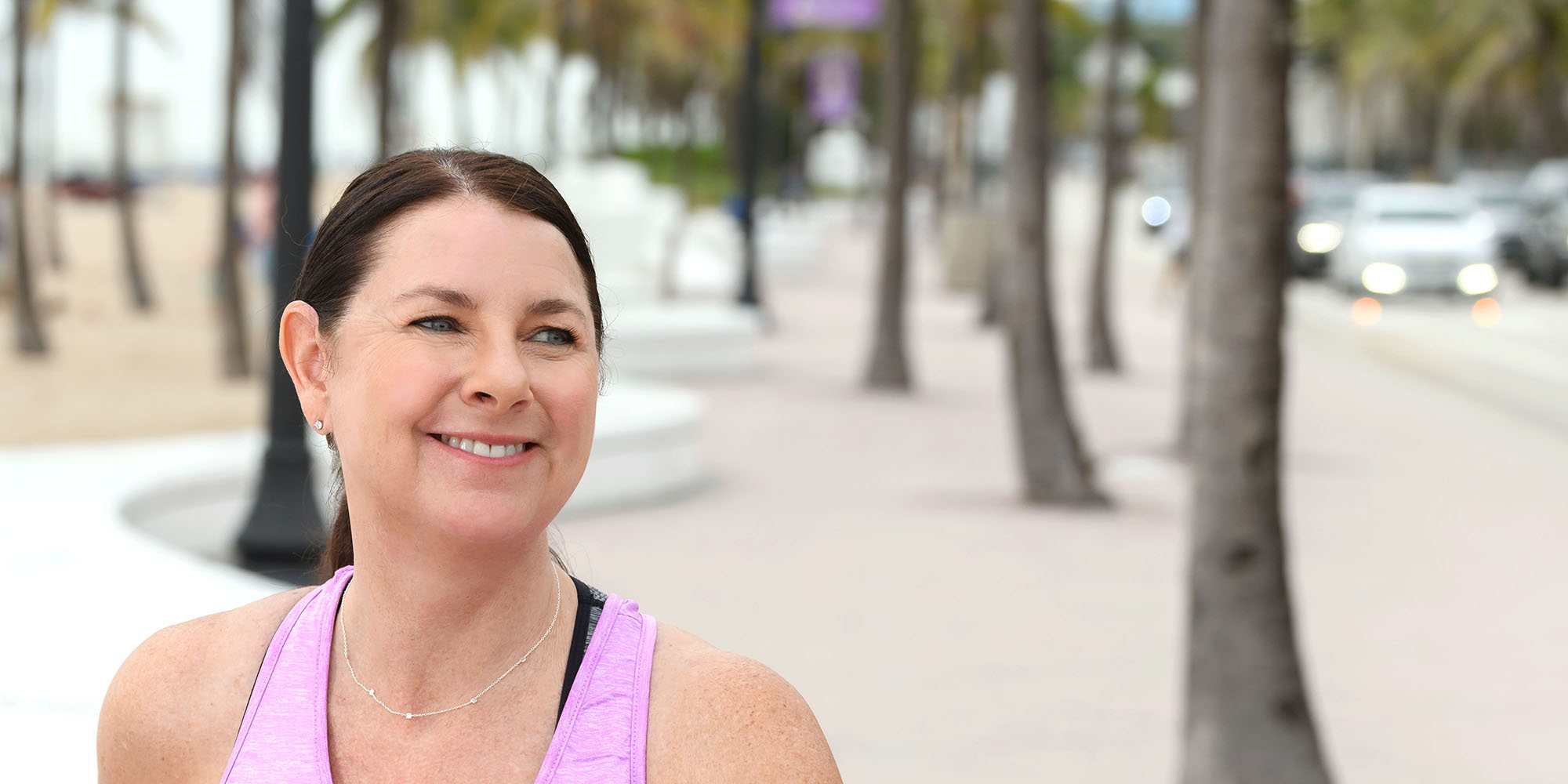 Remarkable woman walking on Fort Lauderdale beach
